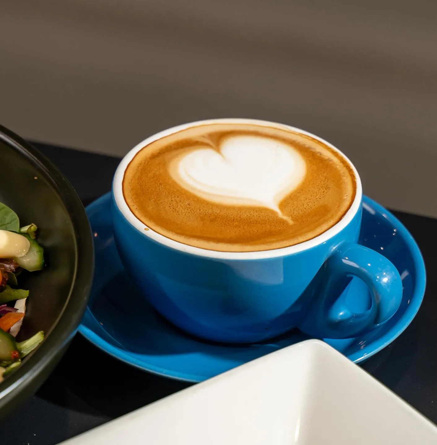 Specialty coffee beside the river at Bliss on Riverside